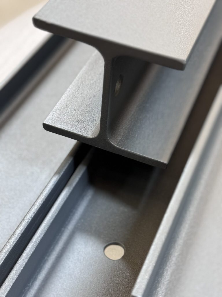 Grey coated steel beam in detail